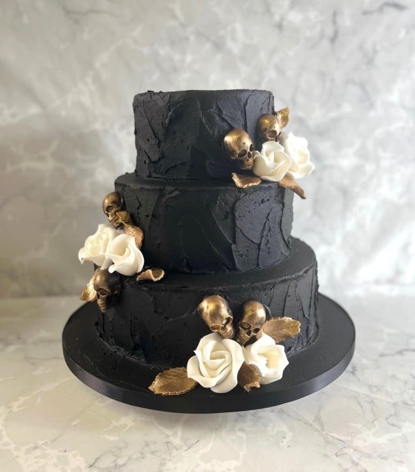 black-buttercream-wedding-cake-with-skulls