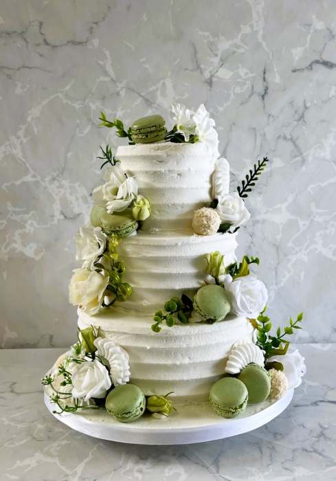 buttercream-wedding-cakde-with-macrons-and-silk-flowers