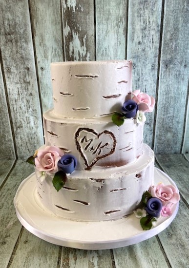 buttercream-wedding-cake-in-a-rustic-tree-design-