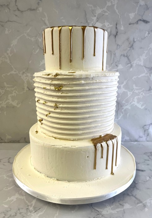 buttercream-wedding-cake-with-gold-drip