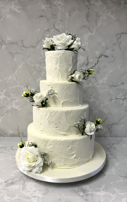 rustic-buttercream-wedding-cake-with-silk-flowers-