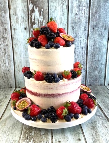 semi-naked-wedding-cake-with-fresh-fruit-