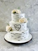 Buttercream  frosting tree bark layered wedding cake 