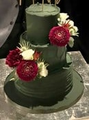 Dark Green  multi textured buttercream wedding cake with silk flowers 