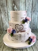 buttercream-wedding-cake-in-a-rustic-tree-design-