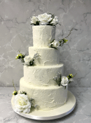 rustic-buttercream-wedding-cake-with-silk-flowers-