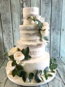 semi-naked-wedding-cake-ans-silk-flowers-and-vines-