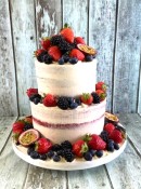 semi-naked-wedding-cake-with-fresh-fruit-