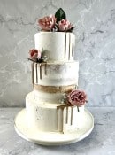semi-naked-with-gold-drip-and-silk-roses-wedding-cake