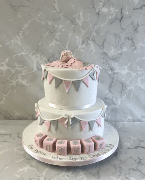 2-tier-sleeping-baby-and-buunting-christening-cake-