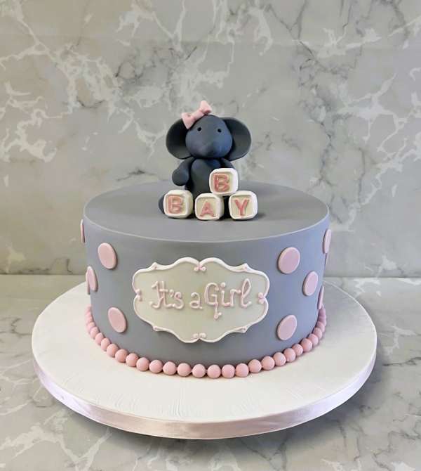 Its-a-girl-baby-shower-cake-with-sogar-elephant-in-gray-and-pink-