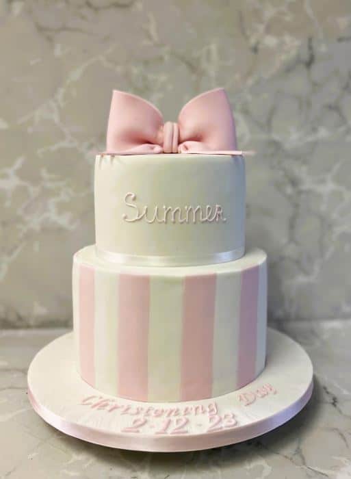 christening-cake-with-pink-and-white-stripes-and-sugar-bow-