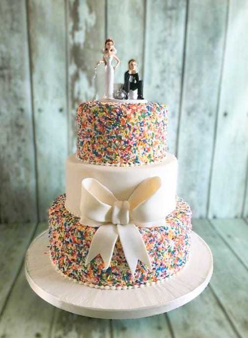 Hundred and Thousand wedding cake with sugar bow