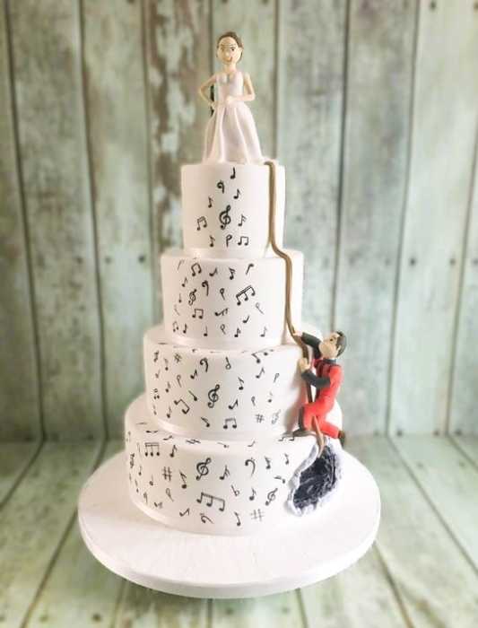Potholing wedding cake with sugar figures