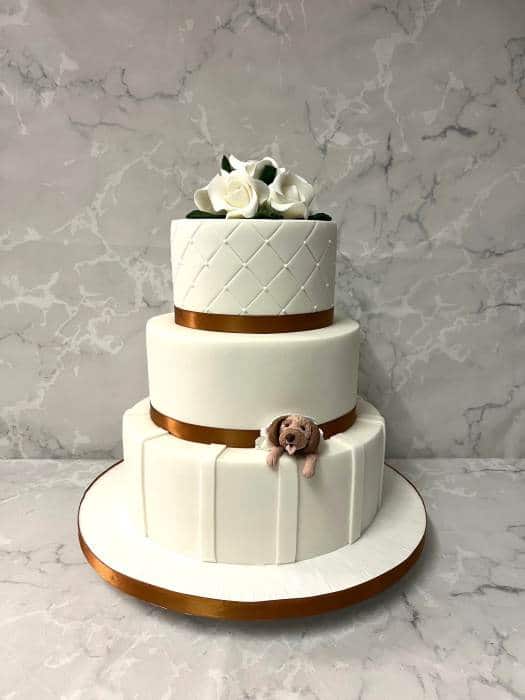 Wedding cake with sugar Family Dog peeping out of the cake