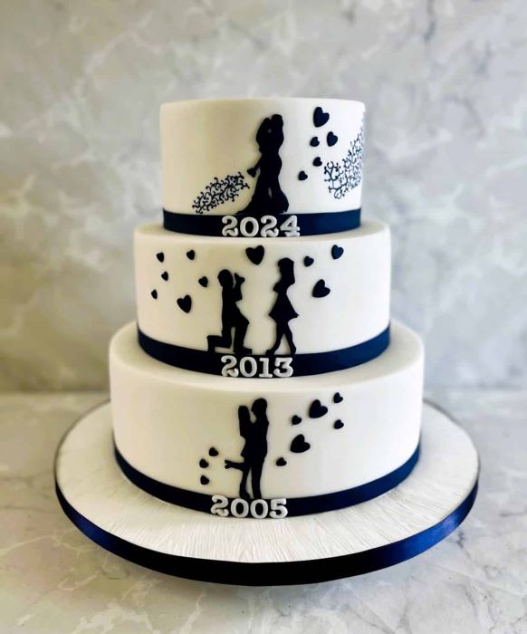 Storybook wedding cake with dates