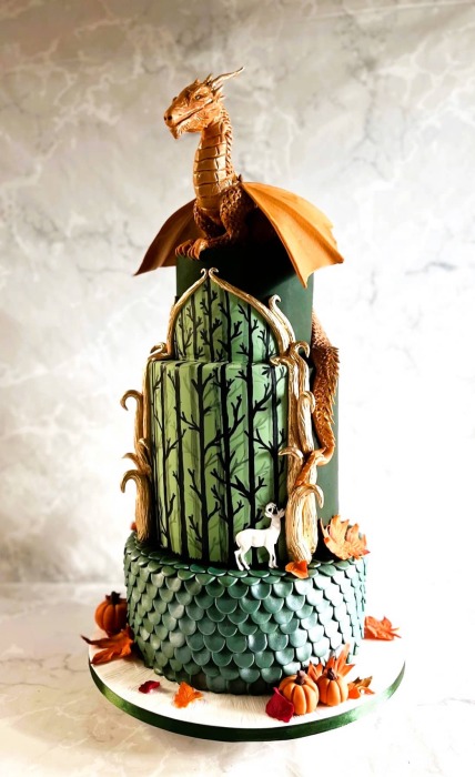 Magical wedding cake with sugar Dragon and Autumn leaves