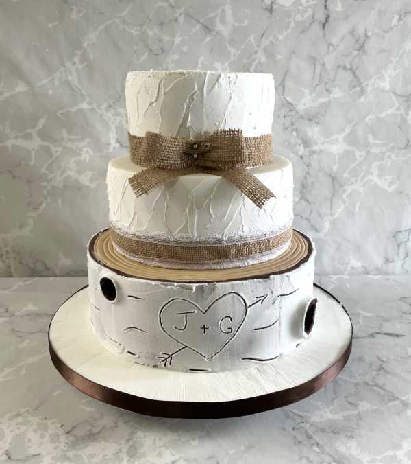 rustic-wedding-cake-with-tree-bark-and-finished-in-royal-icing-