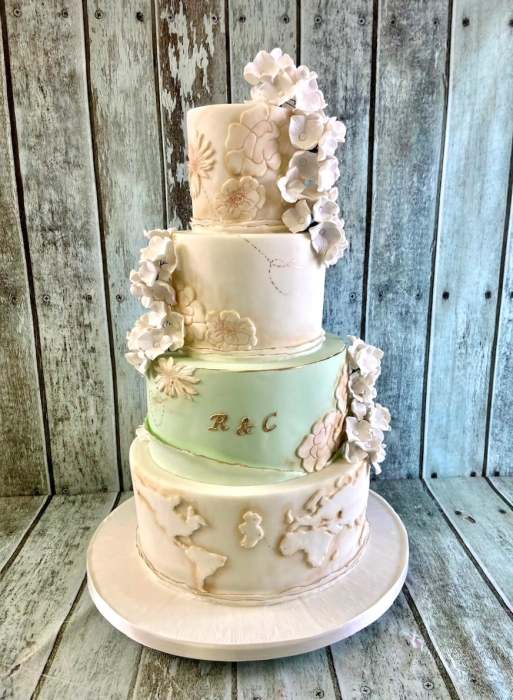 world-map-and-edged-flowers-wedding-cake-
