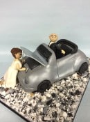 Broken down car wedding cake