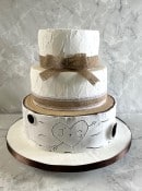 rustic-wedding-cake-with-tree-bark-and-finished-in-royal-icing-