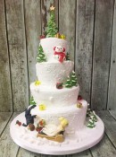 topsy-turvy-sleigh-wedding-cake