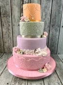 vintage-wedding-cake-with-dog-eating-into-ther-cake-