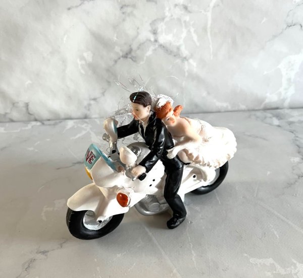 wedding cake Bride and Groom on a white motor bike