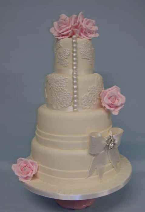 pearl buttons and lace wedding cake