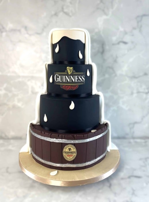 Guinness themed four -tier wedding cake by Amazing Cakes Ireland , cake size 4-6-8-10" €790
