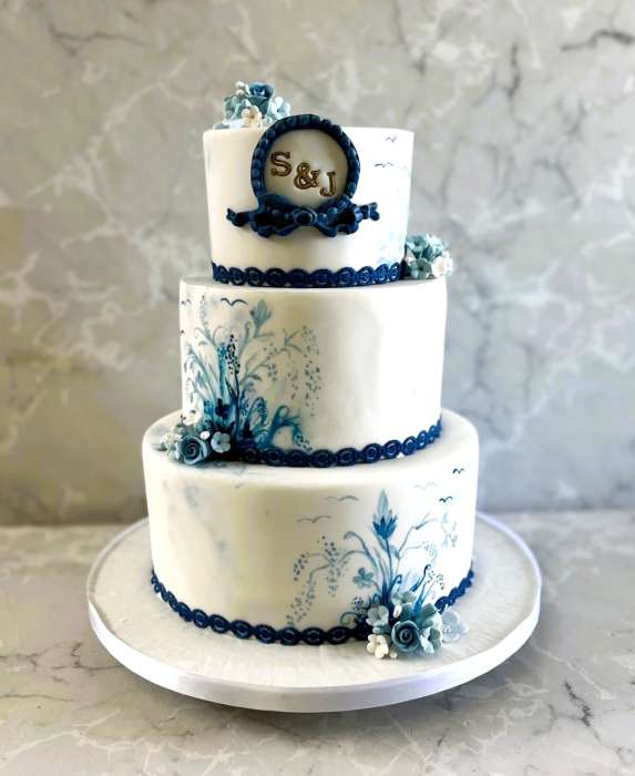 Delicate Hand painted blue wedding cake