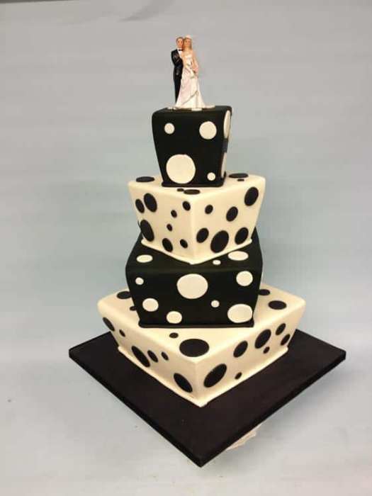 Topsy turvy square wedding cakes