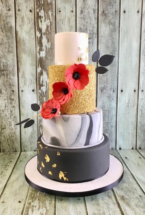 black and gray marbel cake with gold sequins and red poppies wedding cake dublin ireland bray