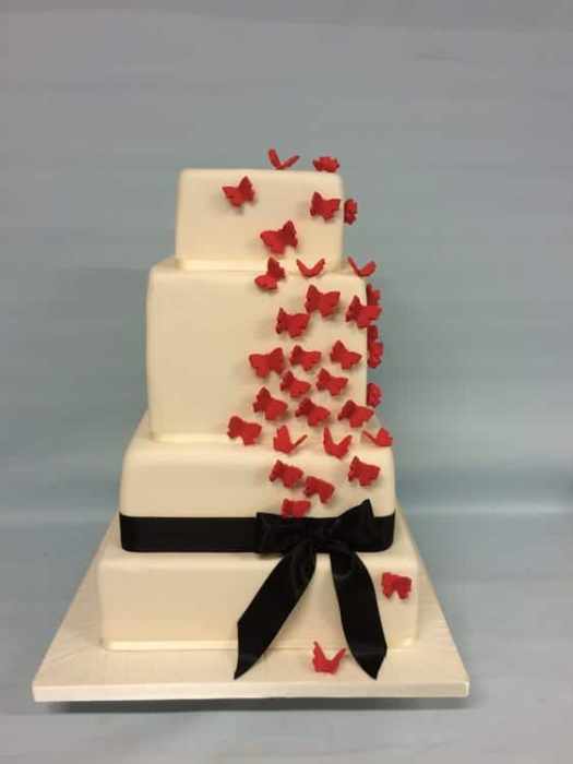 Square Butterfly wedding cake design in red and Black