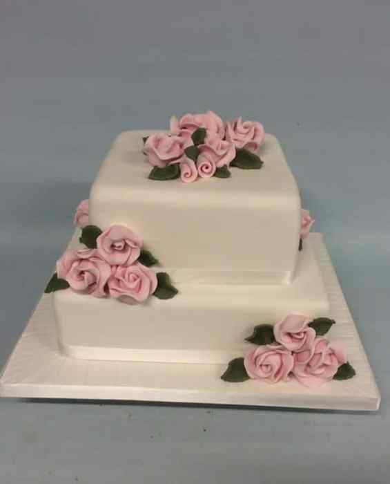 Square 2 tier wedding cake with pink roses