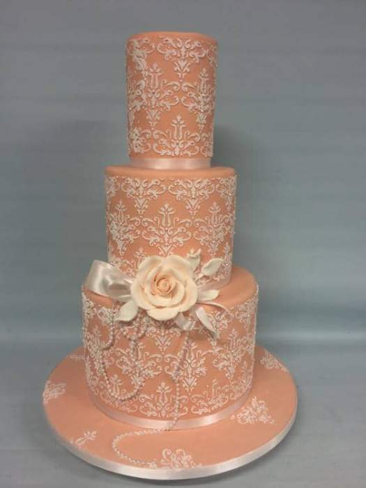 Coral Damask Wedding cake with large roses