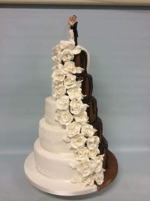 Shabby Chic split wedding cake with cascading roses and chocolate drip