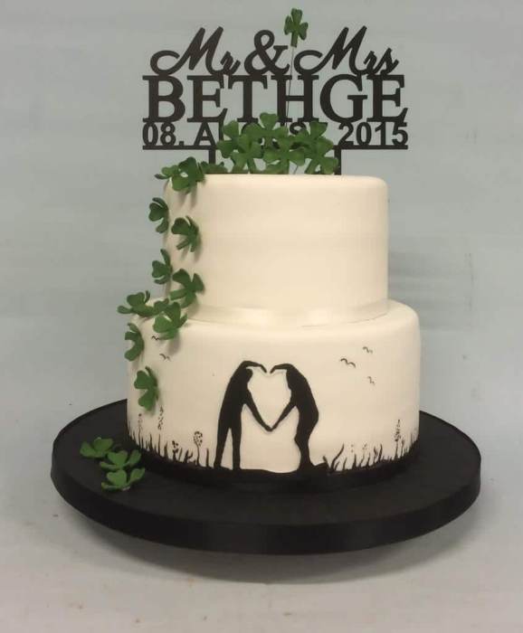 Silhouette with green shamrock wedding cake