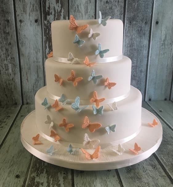 cascading butterflys wedding cake 3 tiers