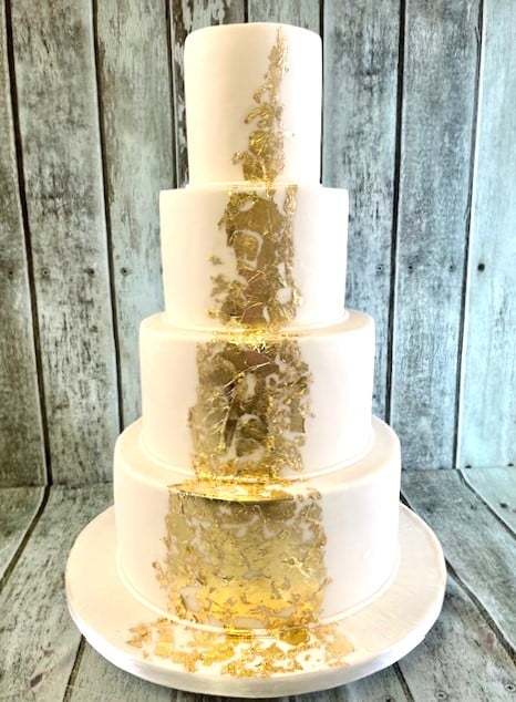 embossed-wedding-cake-with-gold-leaf wedding cake