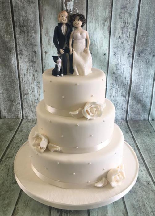 roses and pearl wedding cake with sugar cake toppers