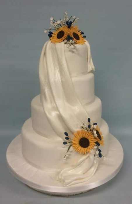 sunflower and drape wedding cake