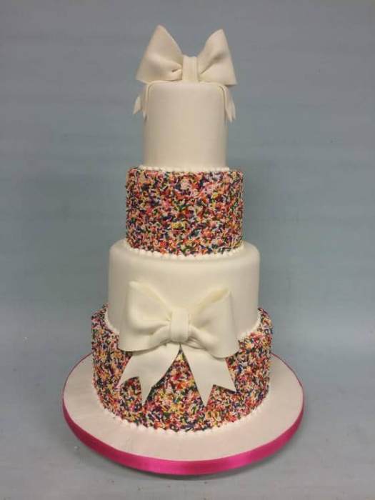 wedding cake jimmy multi coloured sprinkles and bows
