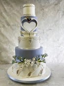 1_hallow-heart-swan-wedding-cake-in-bluebell-colour