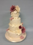 vintage wedding cake with large sugar roses