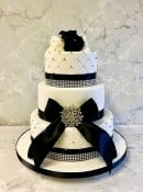 Black and white Diamante and  Satin bow Wedding cake 