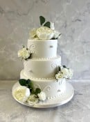 Royal Icing swirls wedding cake with silk 