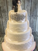 antique lace and diamond band wedding cake