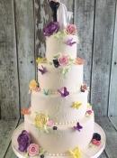 delicate roses and butterflys wedding cake