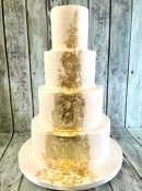 embossed-wedding-cake-with-gold-leaf